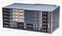 A grey electronic device with many ports Description automatically generated