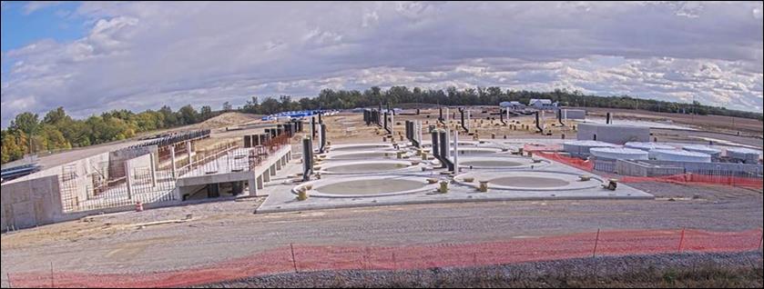 A construction site with many round concrete structures
AI-generated content may be incorrect.