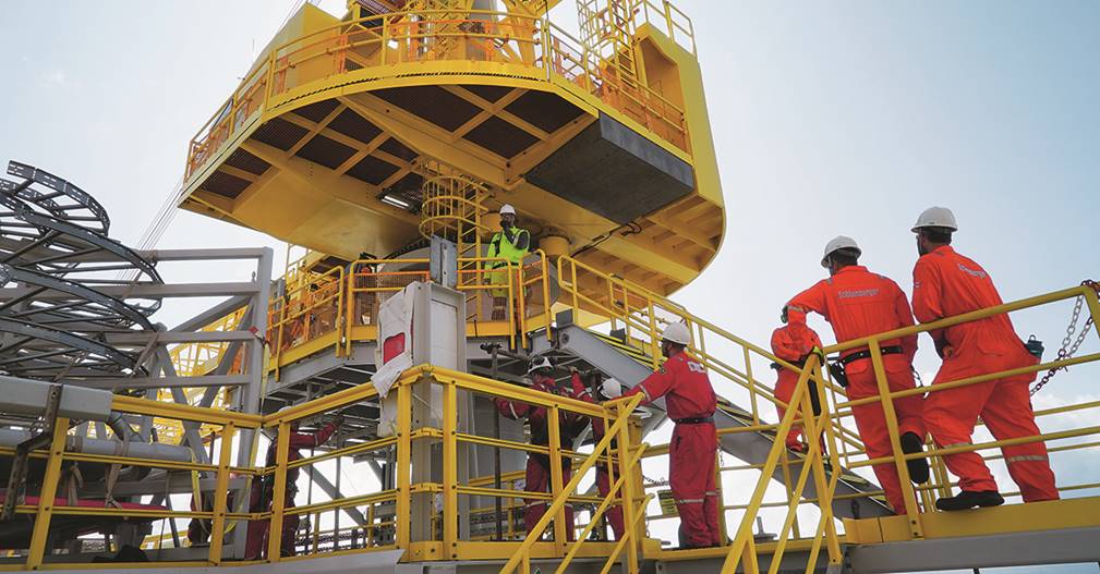 A picture containing yellow, building, man, boat
Description automatically generated
