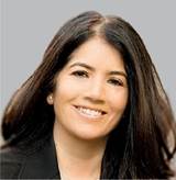 A close-up of a person smiling
Description automatically generated