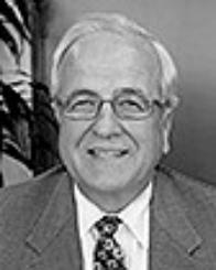 A picture containing person, person, suit, wearing
Description automatically generated