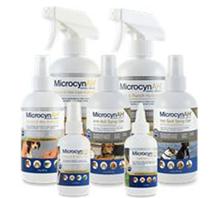 A group of white bottles with labels
Description automatically generated